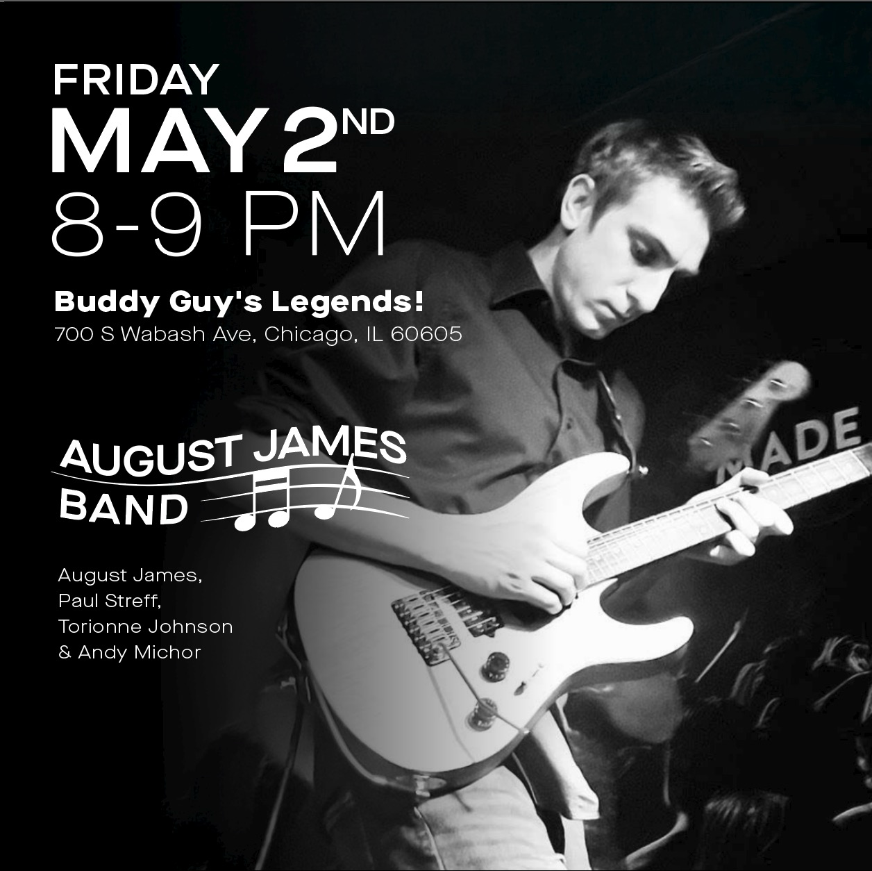 August James singing and playing guitar on stage with purple lighting